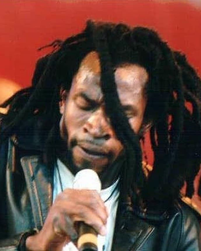 Amaechina’s poster: his face framed by dreadlocks, warm golden light
